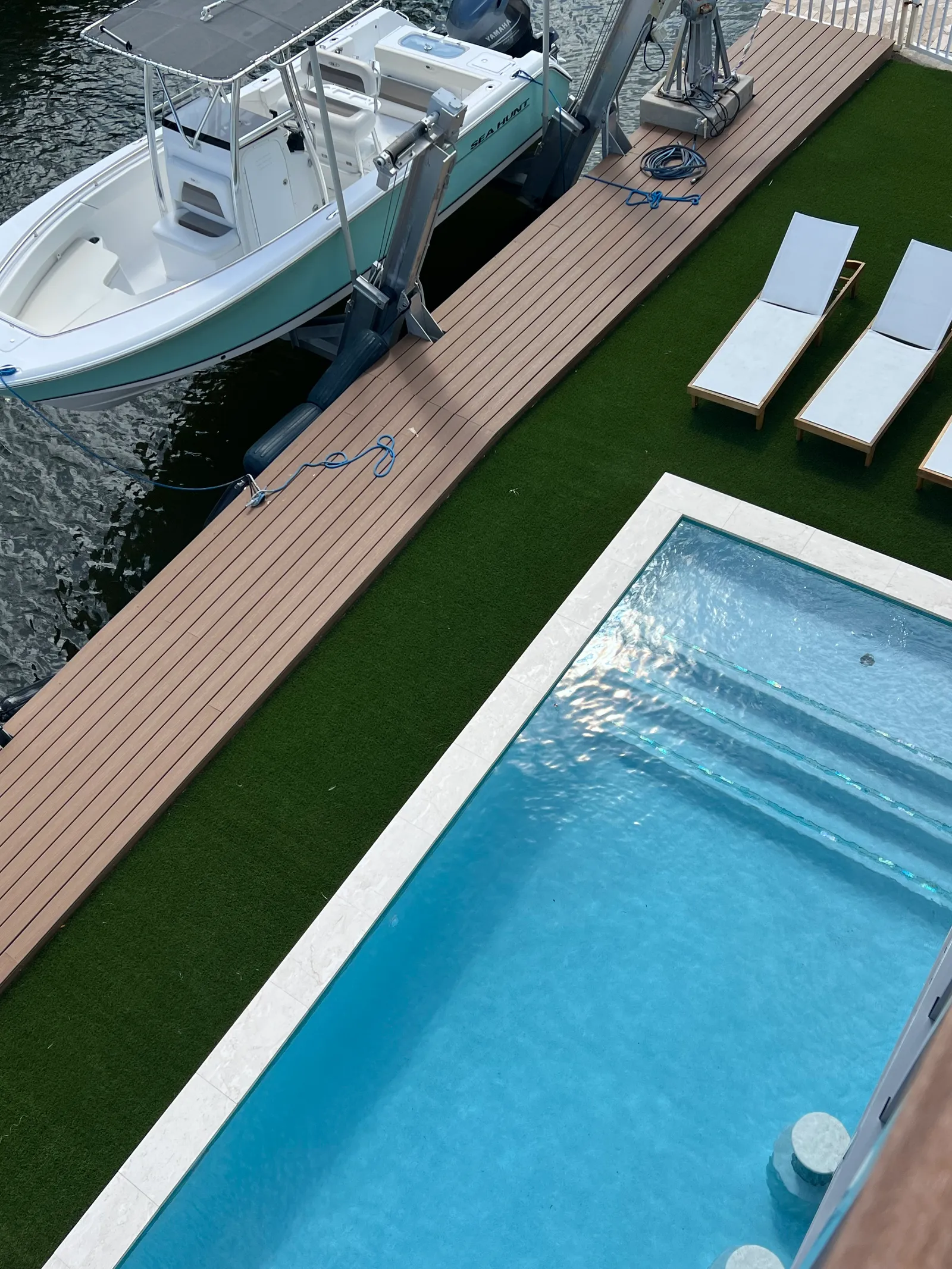 Dock and pool from above — direct boat access